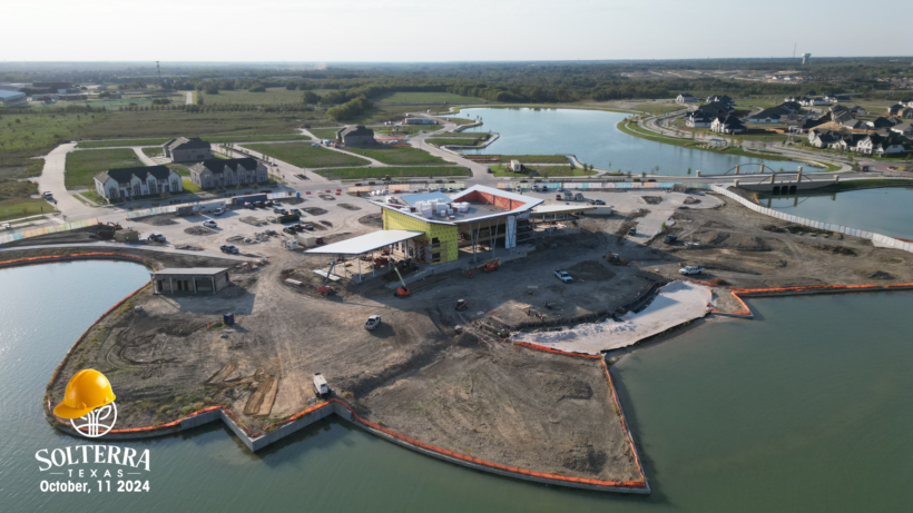 Aerial view of the construction in the back of The Headquarters Amenity Complex, mainly focusing on the side with the resort-style pools. Captured on October 11th, 2024.