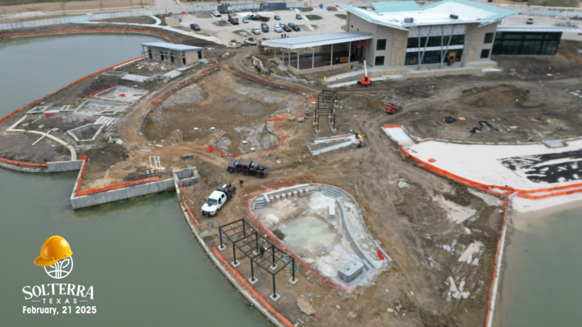 Aerial view showing the construction in the back of The Headquarters Amenity Complex, focusing on the pool side. Captured on February 21st, 2025.