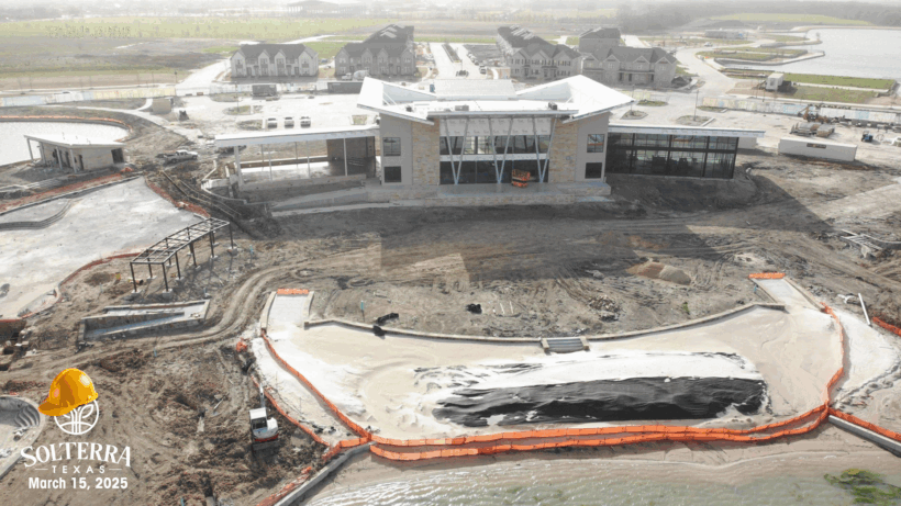 Aerial view showing the construction on back side+outside of building. Captured on March 15, 2025.