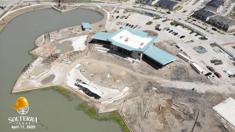 Aerial view showing the construction in the back. Captured on April 11, 2025.