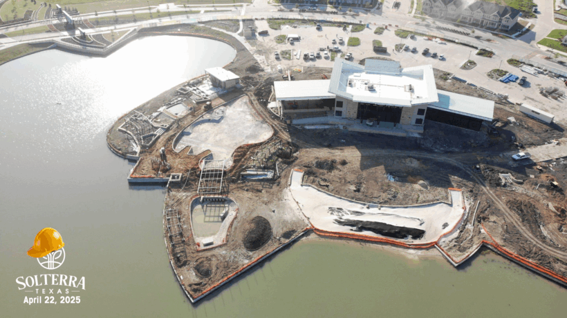 Aerial view showing the construction in the back. Captured on April 22, 2025. 